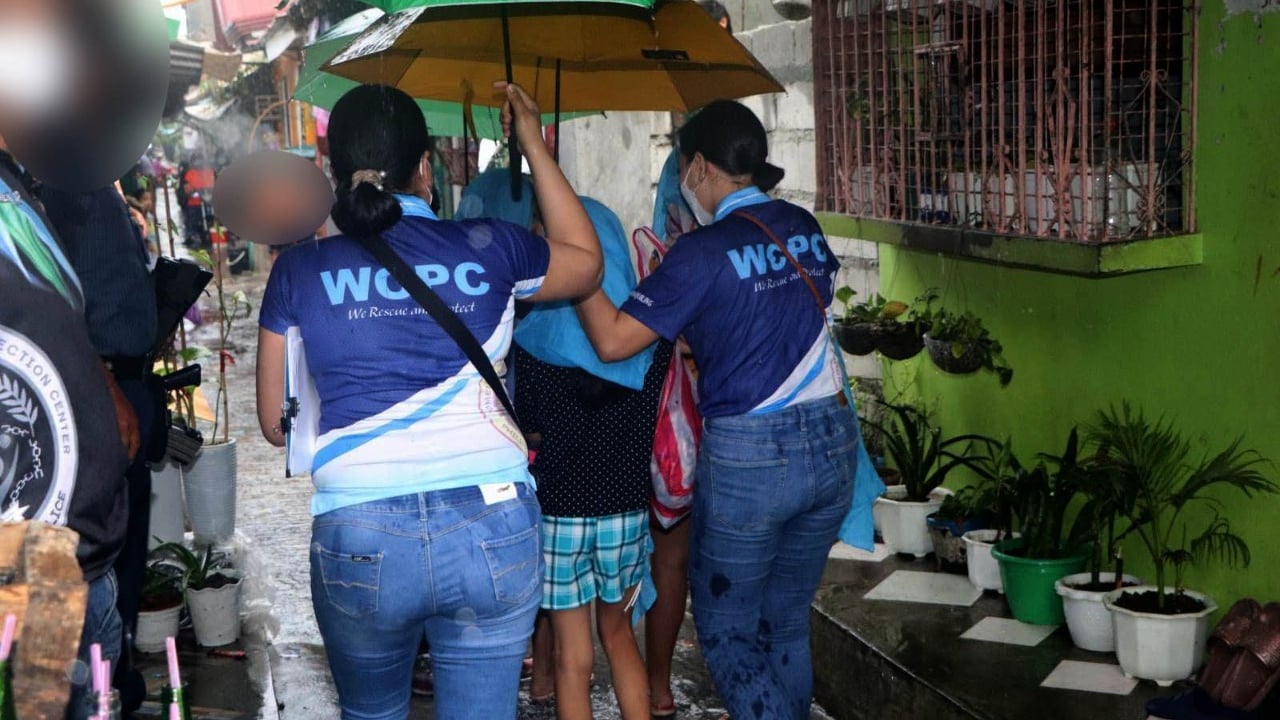 2022 04 WCPC operatives escort young victims Photo by PNP WCPC