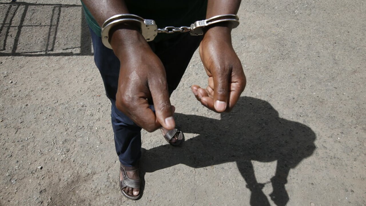 Handcuffs 2021 10 Kenya stock photoshoots Monica Mwangi Approved for Full Use 1 1