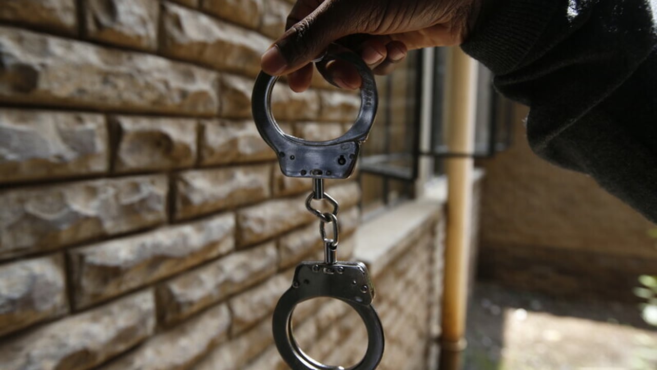 Handcuffs 2021 10 Kenya stock photoshoots Monica Mwangi Approved for Full Use 1