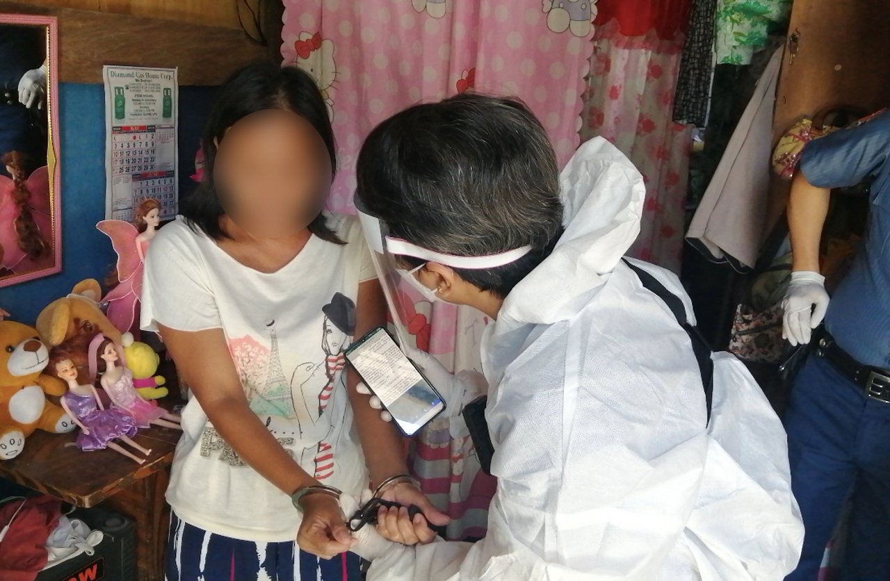 2020 0527 Taguig Op Neighbor perp cuffed and read rights